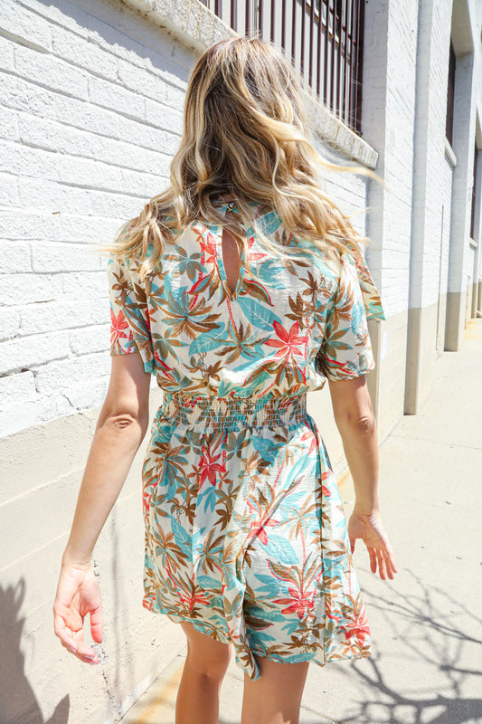 Get Whimsical Tropical Print Smocked Waist Neck Button Romper